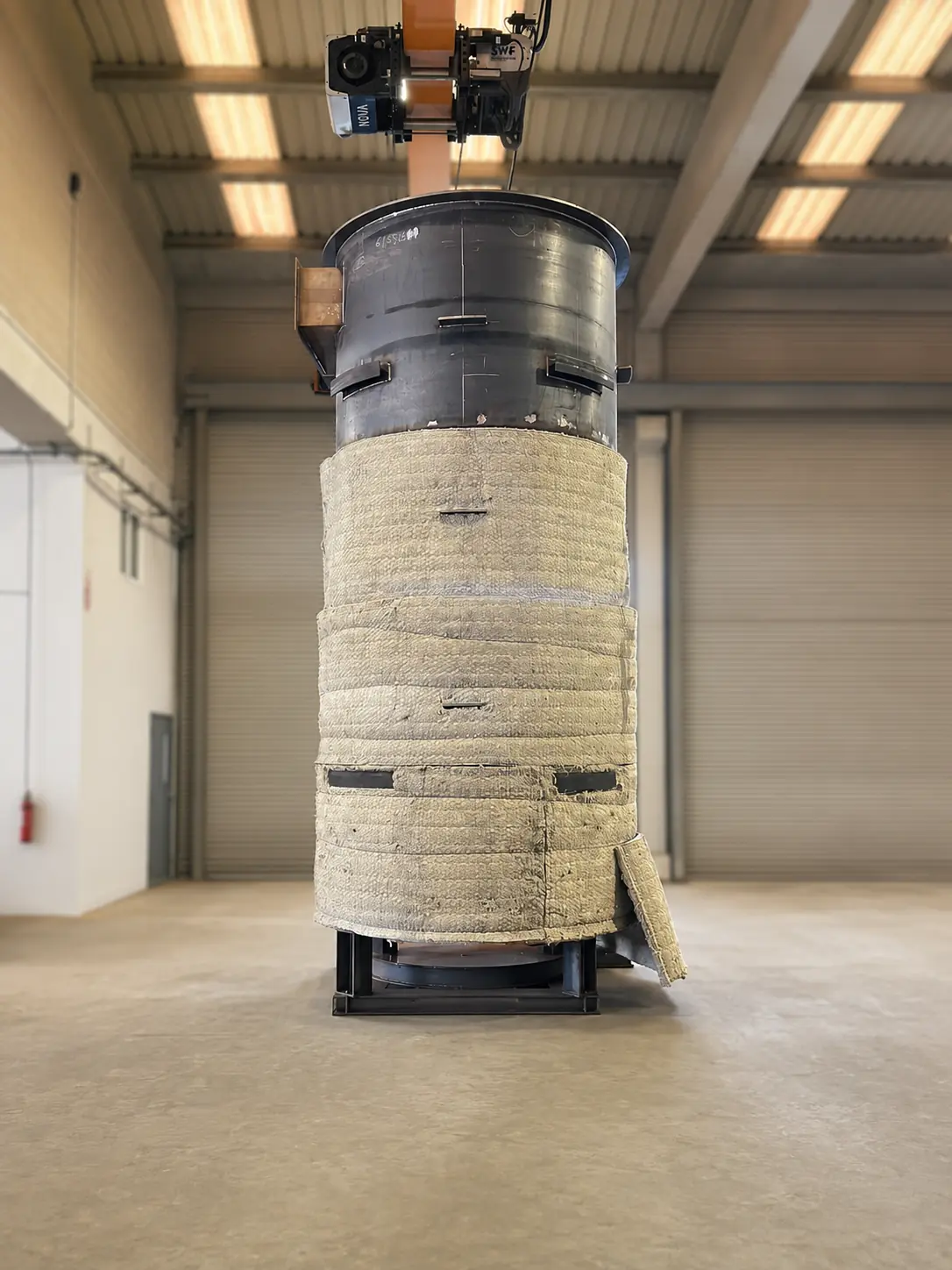 Boiler with thermal insulation blanket in the workshop